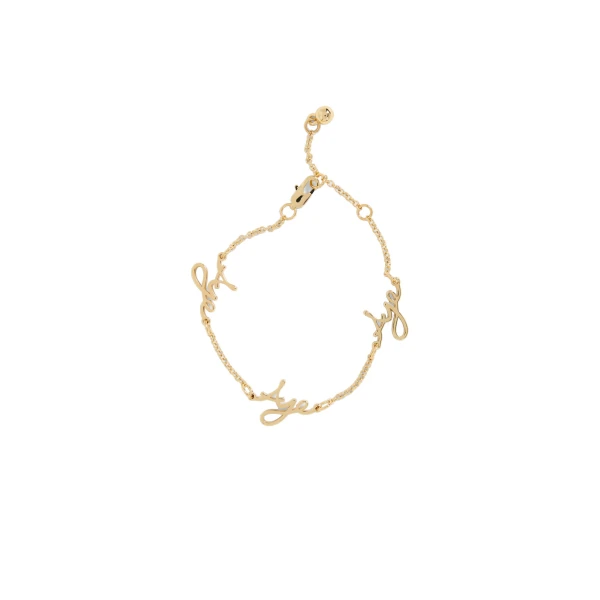 Aje Larissa Cursive Bracelet in Gold | Bracelets | Coveti