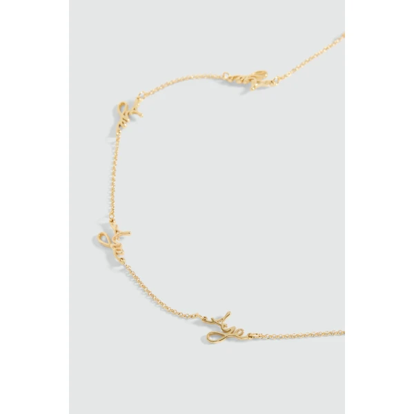 Aje Larissa Cursive Necklace in Gold | Necklace | Coveti