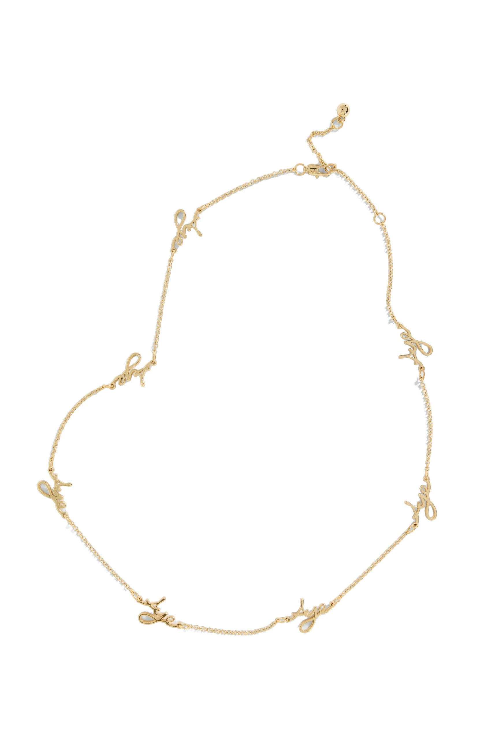 Aje Larissa Cursive Necklace Gold Aje Larissa Cursive Necklace in Gold | Necklace | Coveti