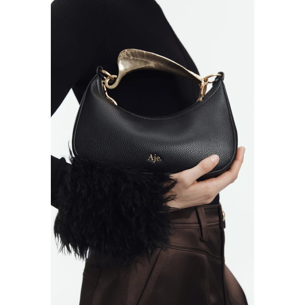 Aje Leaf Texture Top Handle Bag in Black | Shoulder & Crossbody Bags | Coveti