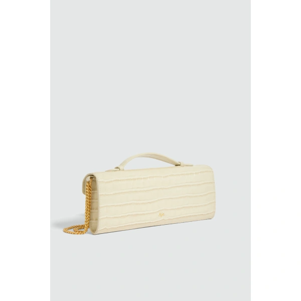 Aje Luna Long Clutch in Ivory Croc | Clutch Bags | Coveti