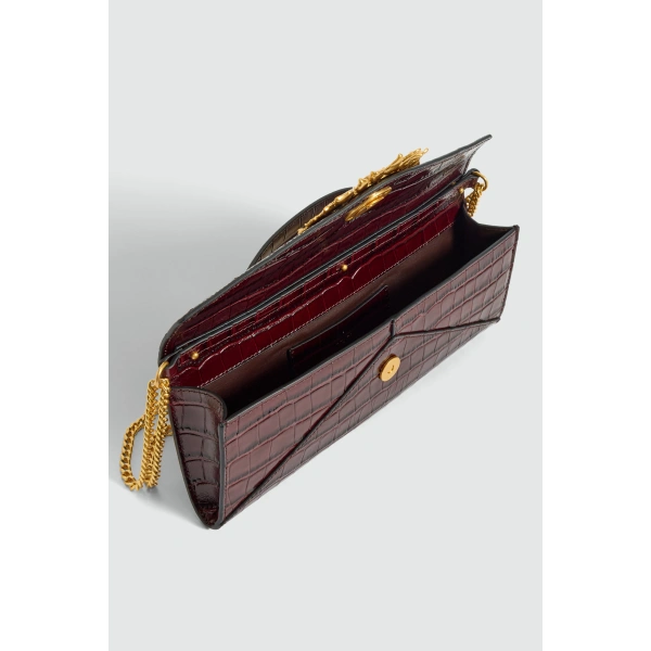 Aje Luna Long Clutch in Merlot Croc | Clutch Bags | Coveti