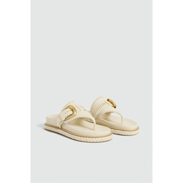 Aje Maxine Buckle Thong in Ivory | Flip Flops & Slides | Coveti