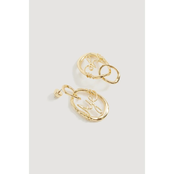Aje Melodia Logo Drop Earring in Gold | Earrings | Coveti