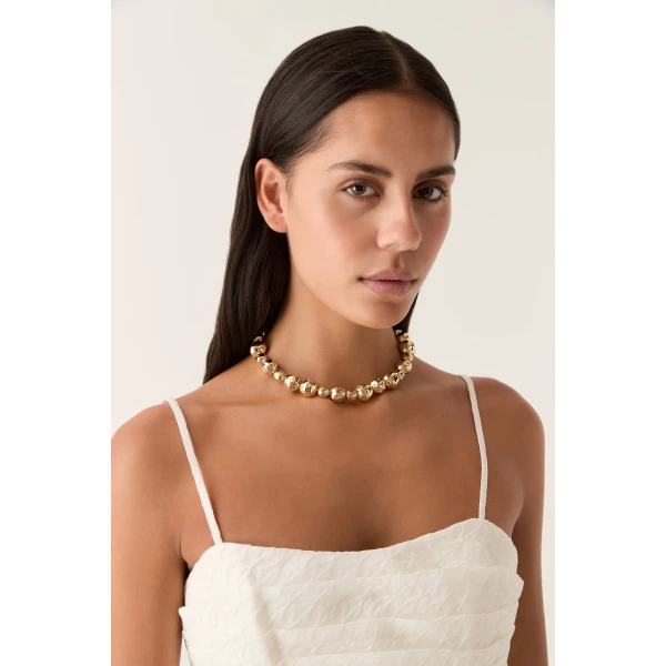 Aje Mercurial Bead Necklace in Gold | Necklace | Coveti
