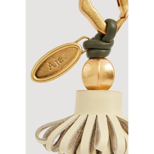 Aje Mini Belle Charm in Butter-Pink | Bag charms | Coveti