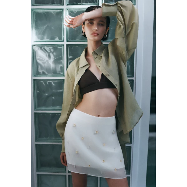 Aje Naia Mini Skirt in Eggshell | Skirts | Coveti