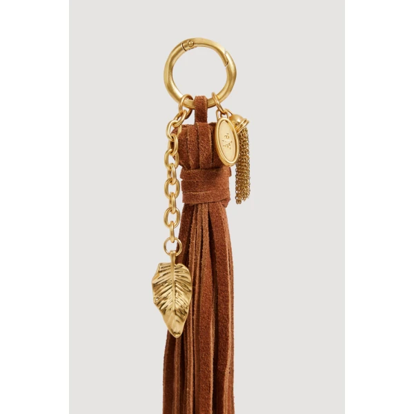 Aje Nokaya Tassel Charm in Amber Brown | Bag charms | Coveti
