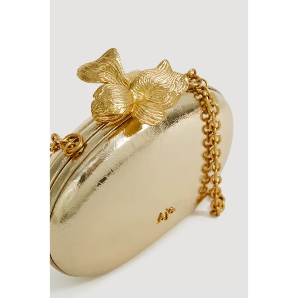 Aje Retrofete Clutch in Light Gold | Clutch Bags | Coveti