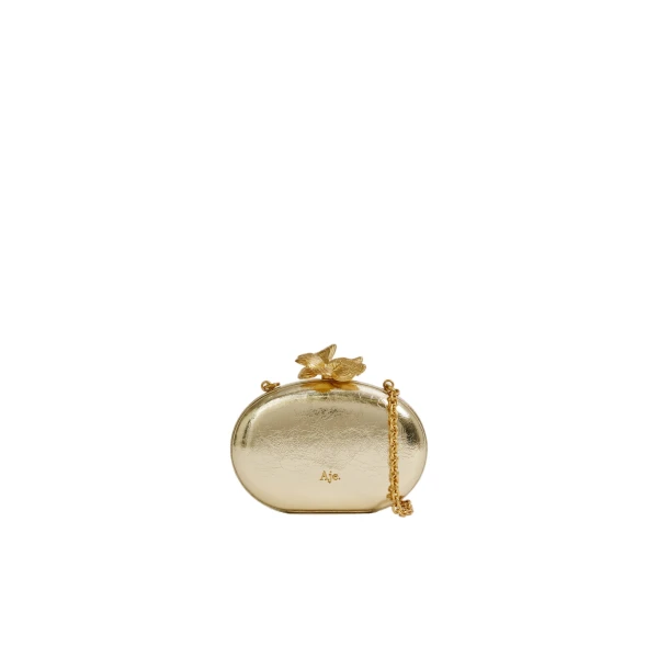 Aje Retrofete Clutch in Light Gold | Clutch Bags | Coveti