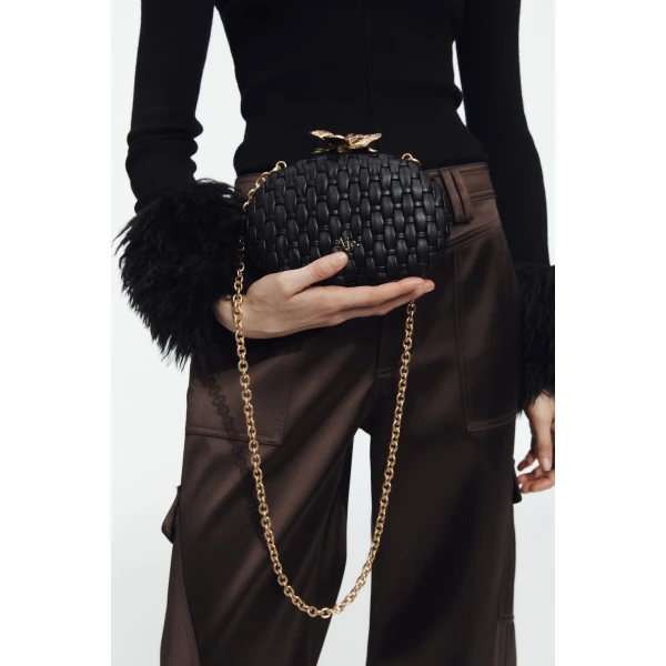 Aje Retrofete Woven Clutch in Black | Clutch Bags | Coveti