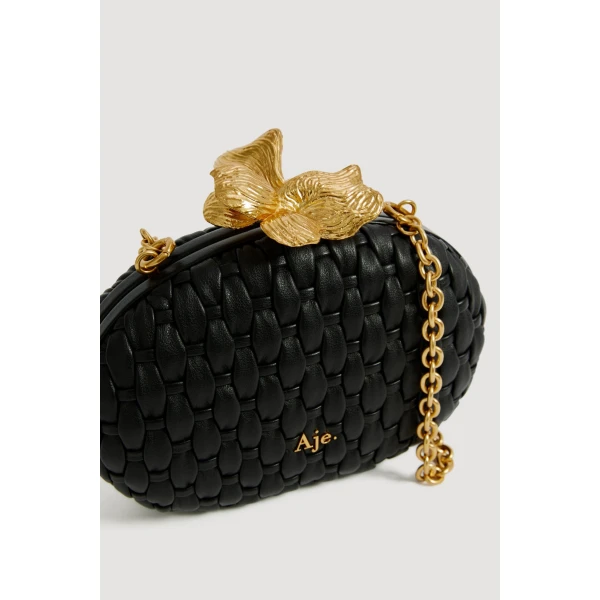 Aje Retrofete Woven Clutch in Black | Clutch Bags | Coveti