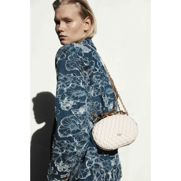 Aje Retrofete Woven Clutch in Ivory | Clutch Bags | Coveti