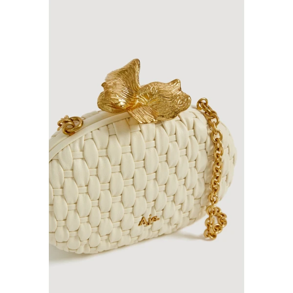 Aje Retrofete Woven Clutch in Ivory | Clutch Bags | Coveti