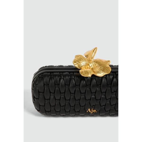 Aje Retrofete Woven Long Clutch in Black | Clutch Bags | Coveti