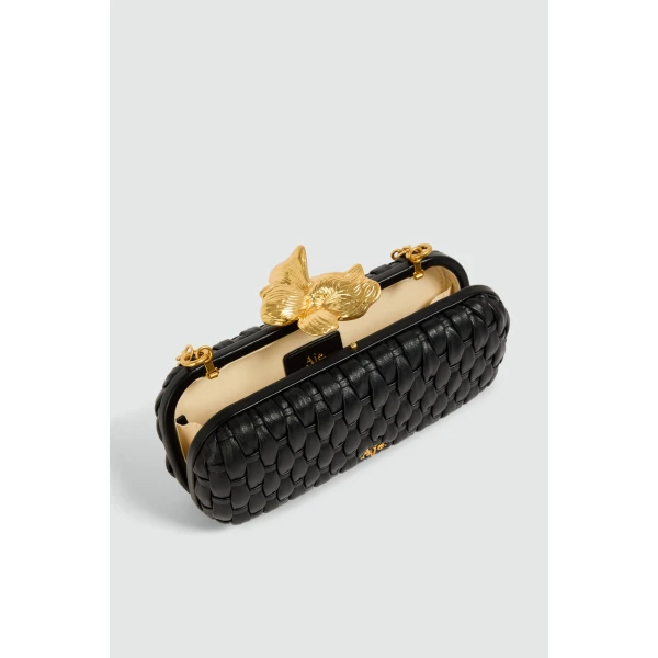 Aje Retrofete Woven Long Clutch in Black | Clutch Bags | Coveti
