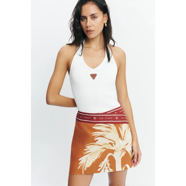 Aje Sol Mini Skirt in Ember | Skirts | Coveti