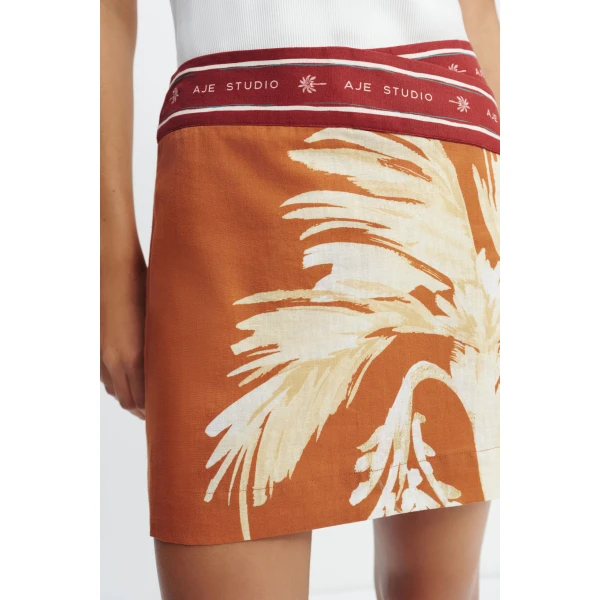 Aje Sol Mini Skirt in Ember | Skirts | Coveti