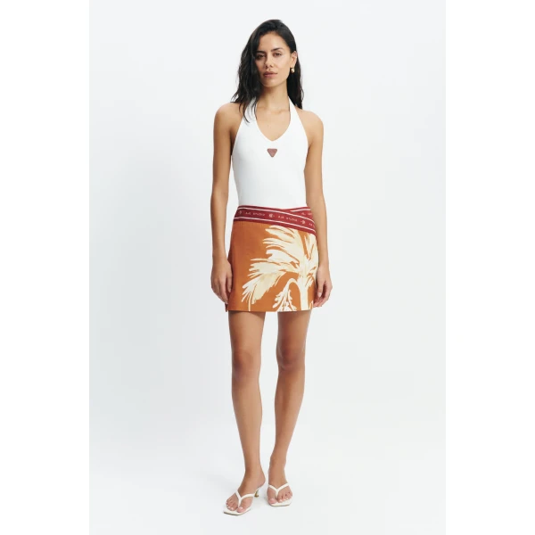 Aje Sol Mini Skirt in Ember | Skirts | Coveti