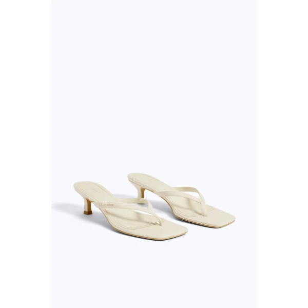 Aje Studio Thong Heel in Ivory | Heels | Coveti