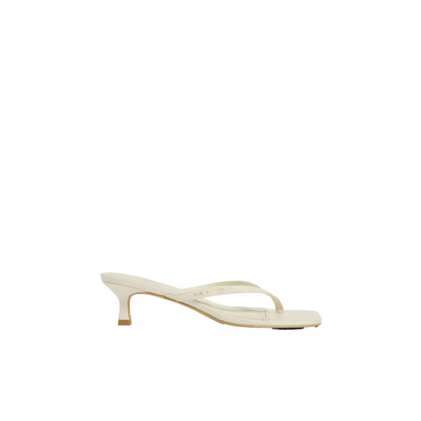 Aje Studio Thong Heel in Ivory | Heels | Coveti