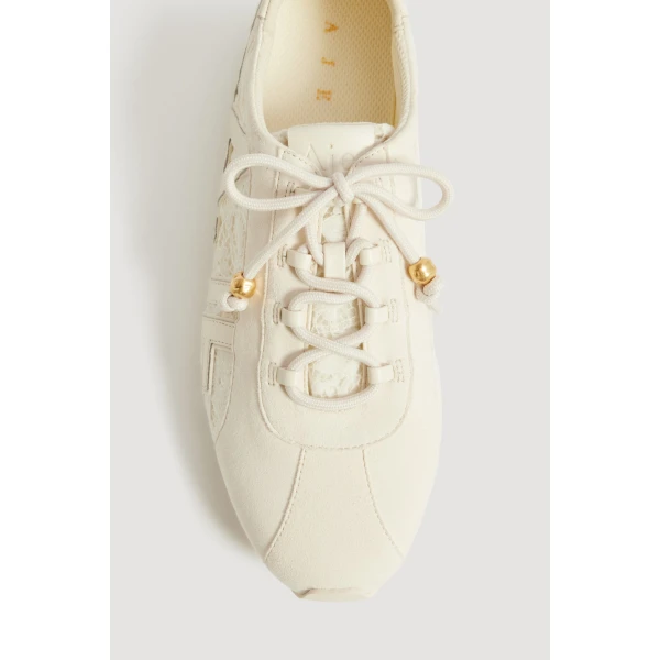 Aje Valli Lace Logo Trainer in Ivory Velvetine | Sneakers | Coveti