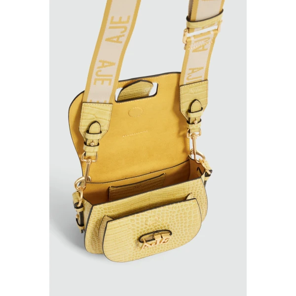 Aje Viva Croc Emboss Saddle Bag in Golden Ochre Croc | Shoulder & Crossbody Bags | Coveti