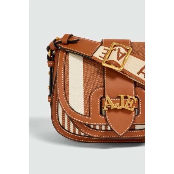 Aje Viva Small Canvas Saddle Bag in Spiced Chai/Natural | Shoulder & Crossbody Bags | Coveti
