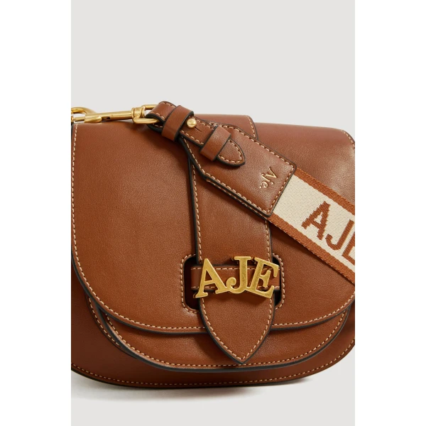 Aje Viva Small Saddle Bag in Spiced Chai | Shoulder & Crossbody Bags | Coveti