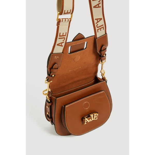 Aje Viva Small Saddle Bag in Spiced Chai | Shoulder & Crossbody Bags | Coveti
