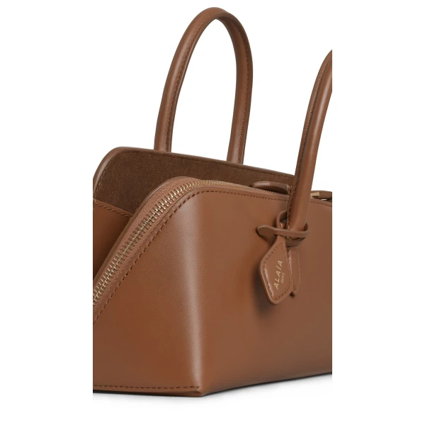 Alaia Delta Small Bag in Box Calfskin, Amber | Totes & Top-Handle Bags | Coveti