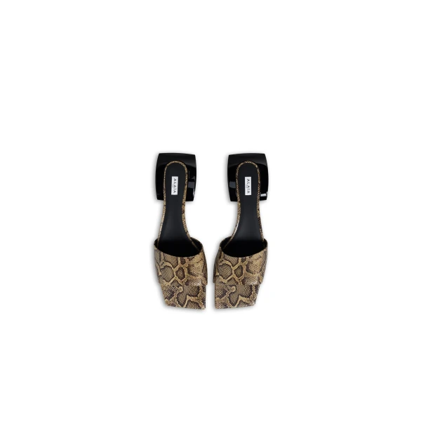Alaia Ellipse Mules in Ayers Leather, Honey | Mules | Coveti