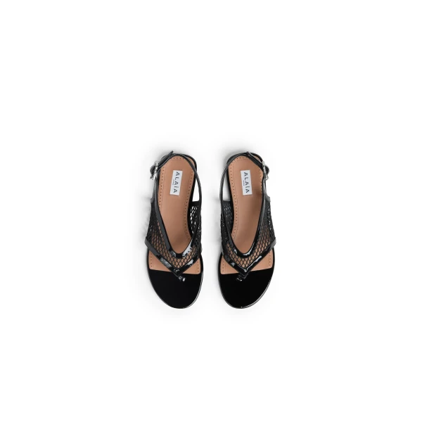 Alaia Fishnet Thong Sandals in Patent Calfskin, Black | Sandals | Coveti