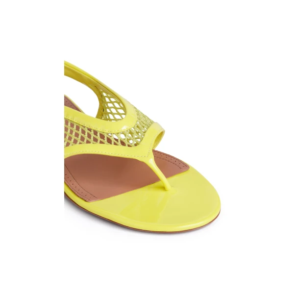 Alaia Fishnet Thong Sandals in Patent, Lemon Yellow | Sandals | Coveti