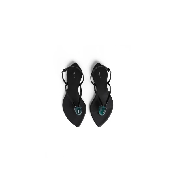 Alaia Flat Jewel Sandals in Patent Leather, Black | Sandals | Coveti
