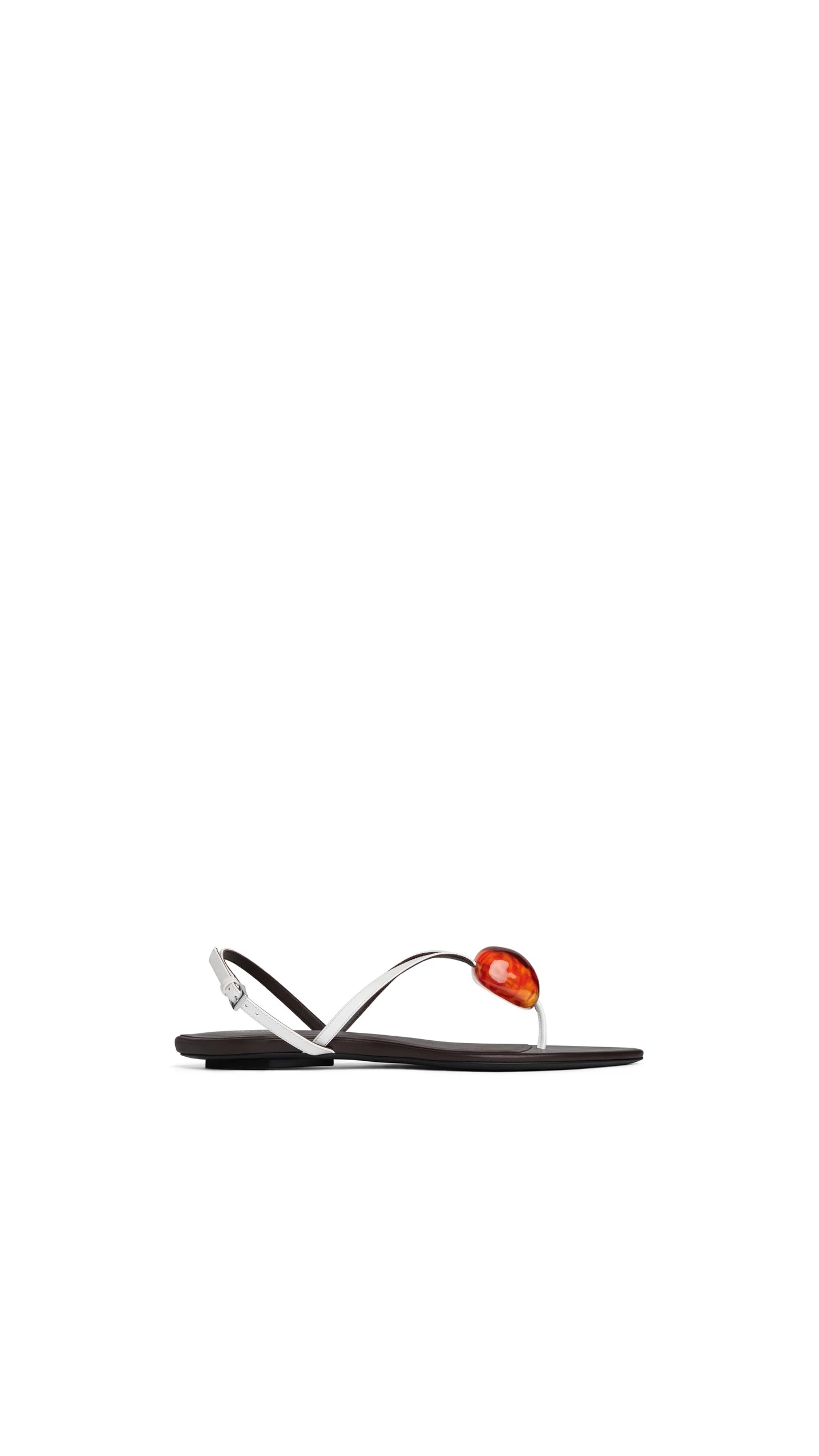 Alaia Flat Jewel Sandals in Patent Leather, Optical White Alaia Flat Jewel Sandals in Patent Leather, Optical White | Sandals | Coveti