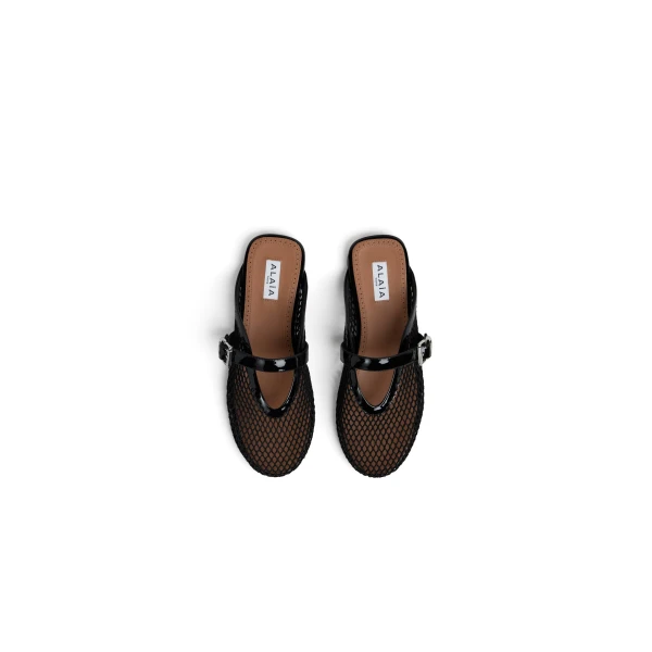 Alaia Flat Mules in Fishnet, Black | Mules | Coveti