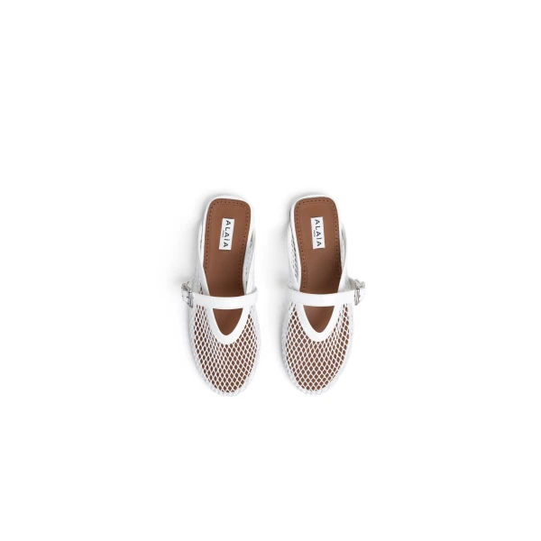 Alaia Flat Mules in Fishnet, Optical White | Mules | Coveti