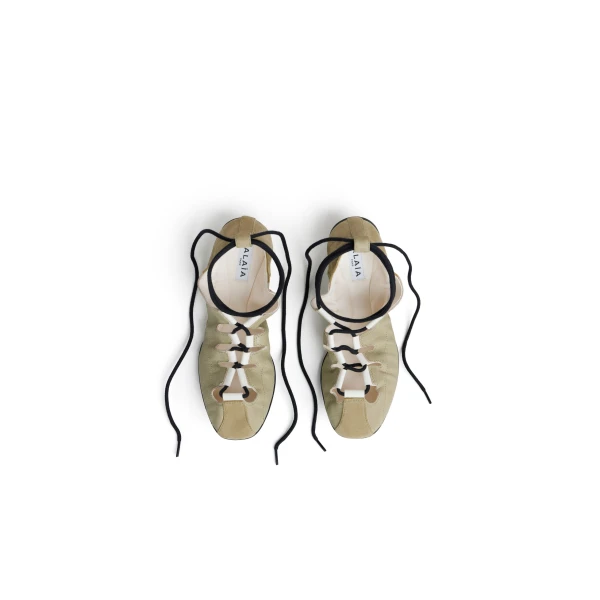 Alaia Fold Laced Flats in Leather, Almond Green | Flats | Coveti