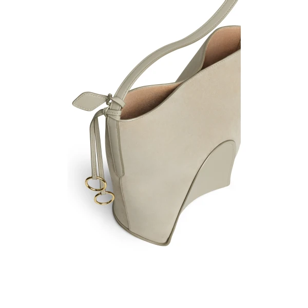 Alaia Hip Small Bucket Bi-Material Bag in Leather, Beige Grey | Bucket Bags | Coveti