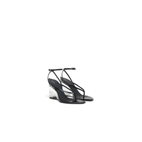 Alaia Invisible Thong Sandals in Patent Calfskin, Black | Sandals | Coveti