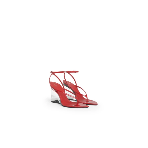 Alaia Invisible Thong Sandals in Patent Calfskin, Burnt Orange | Sandals | Coveti