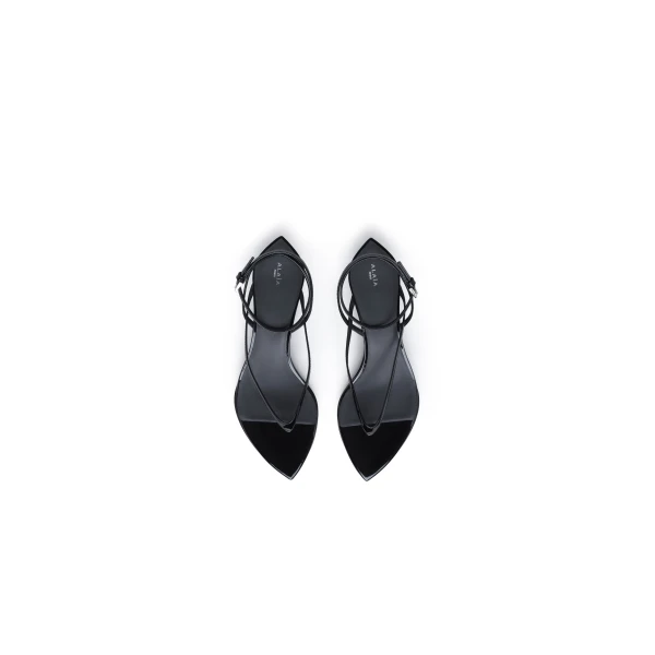 Alaia Invisible Thong in Patent Calfskin, Black | Sandals | Coveti