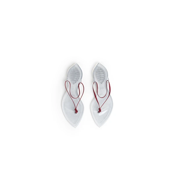 Alaia Invisible Thong in Patent Leather, Carmine | Sandals | Coveti