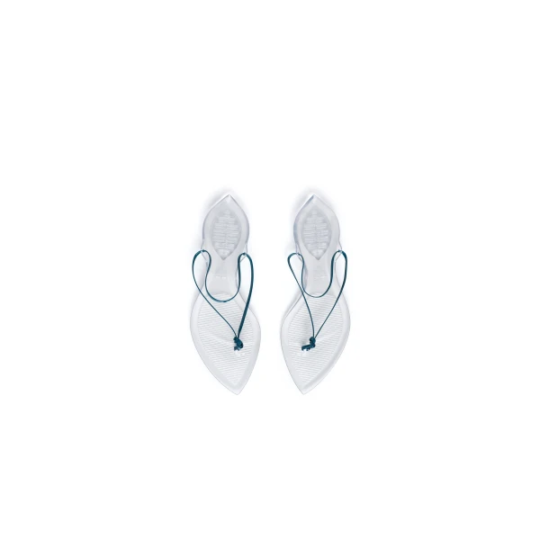 Alaia Invisible Thong in Patent Leather, China Blue | Sandals | Coveti