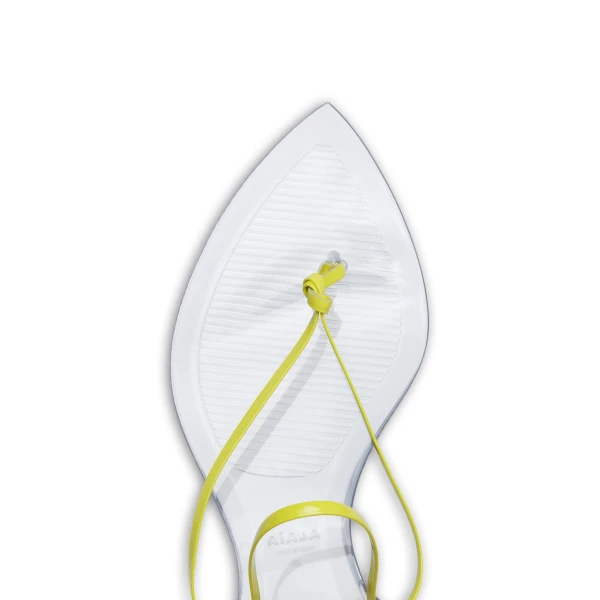 Alaia Invisible Thong in Patent Leather, Lemon Yellow | Sandals | Coveti