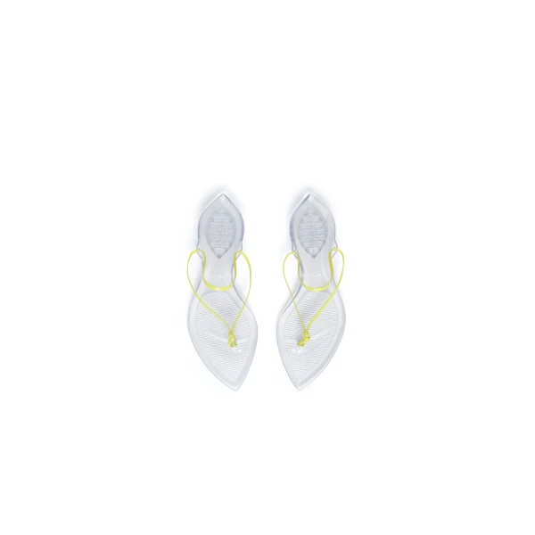 Alaia Invisible Thong in Patent Leather, Lemon Yellow | Sandals | Coveti