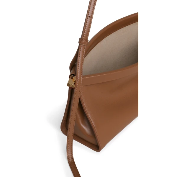 Alaia Le Click East West Medium Bag in Calfskin, Amber | Shoulder & Crossbody Bags | Coveti