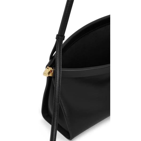 Alaia Le Click East West Medium Bag in Calfskin, Dark Brown | Shoulder & Crossbody Bags | Coveti