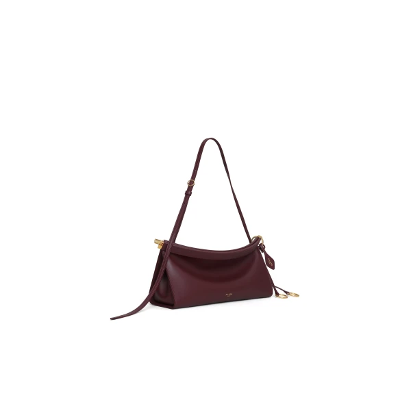 Alaia Le Click East West Medium Bag in Calfskin, Garnet Red | Shoulder & Crossbody Bags | Coveti
